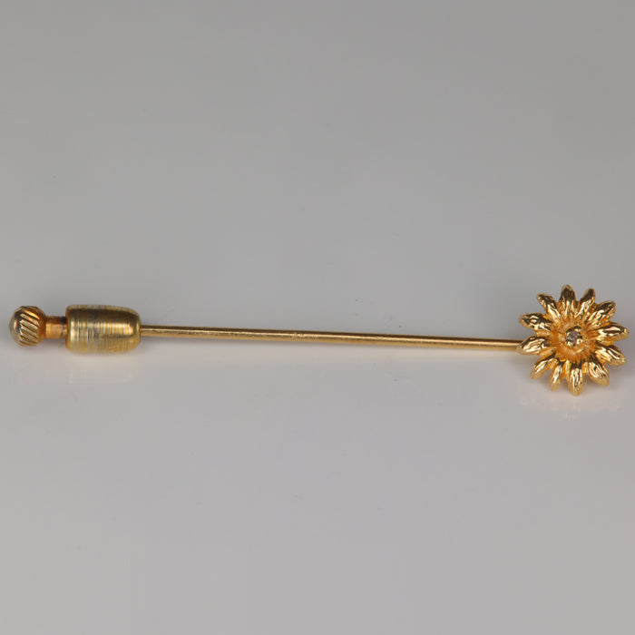 yellow gold flower pin with diamond accent