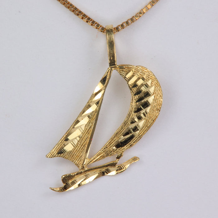 yellow gold sailboat pendant