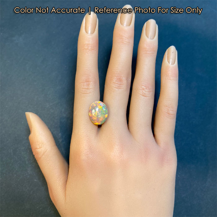 size of oval cut opal gem to hand