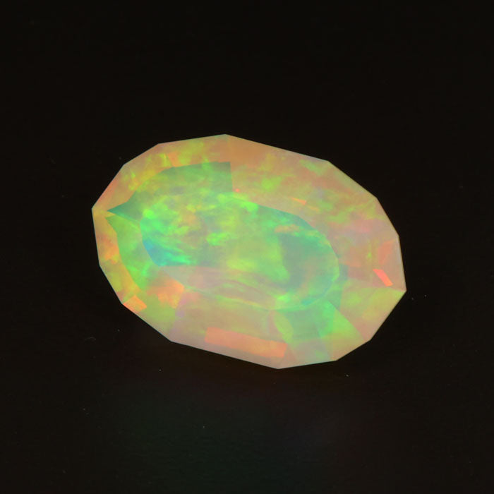 oval faceted opal gemstone