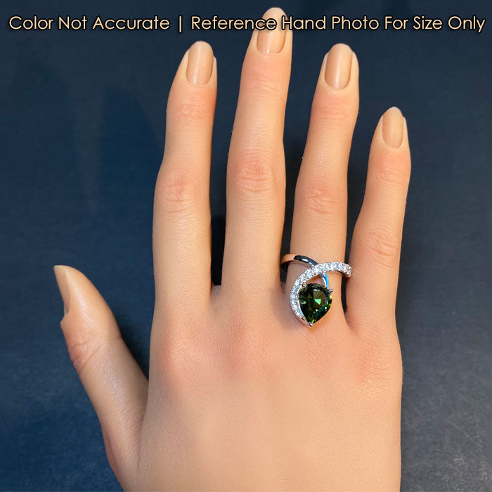 pear shape fancy green tanzanite ring with diamonds in white gold