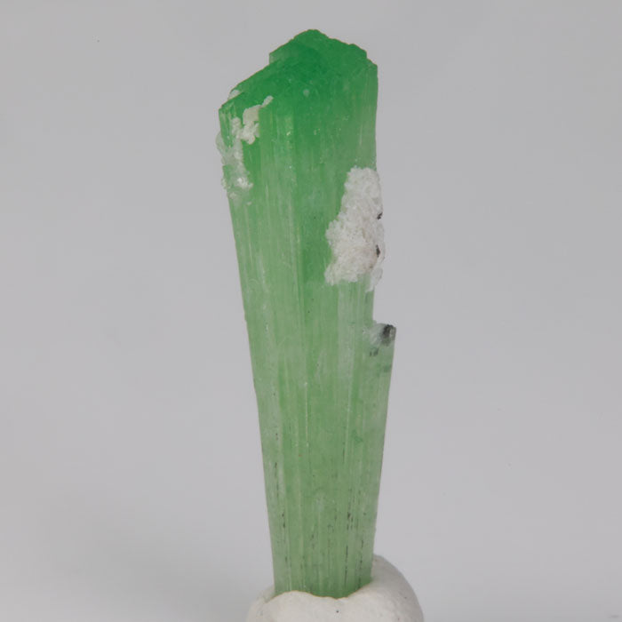 green tourmaline crystal specimen