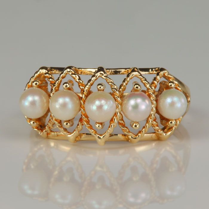 yellow gold pearl ring with twist details