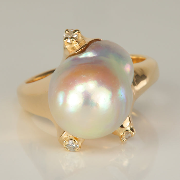 yellow gold freeform pearl ring with diamond accents