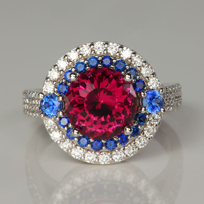white gold ring with garnet sapphire and diamond