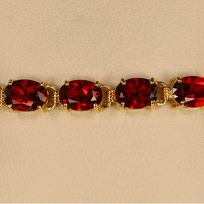 estate bracelet with deep red garnet gems
