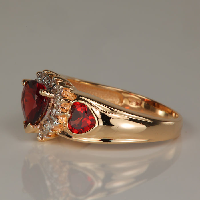 yellow gold garnet and diamond ring 