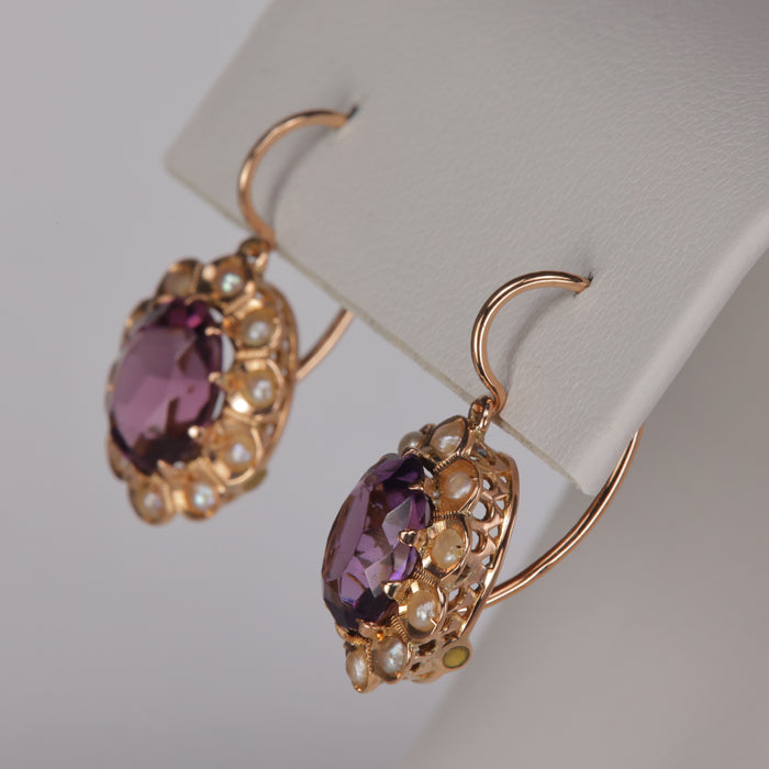 vintage gold earrings with faceted purple glass and seed pearls