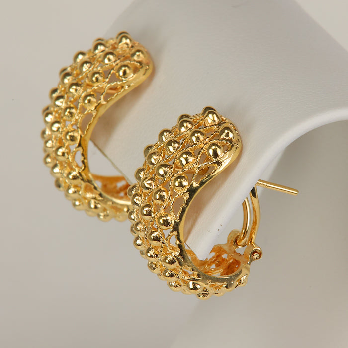 woven yellow gold earrings with beads