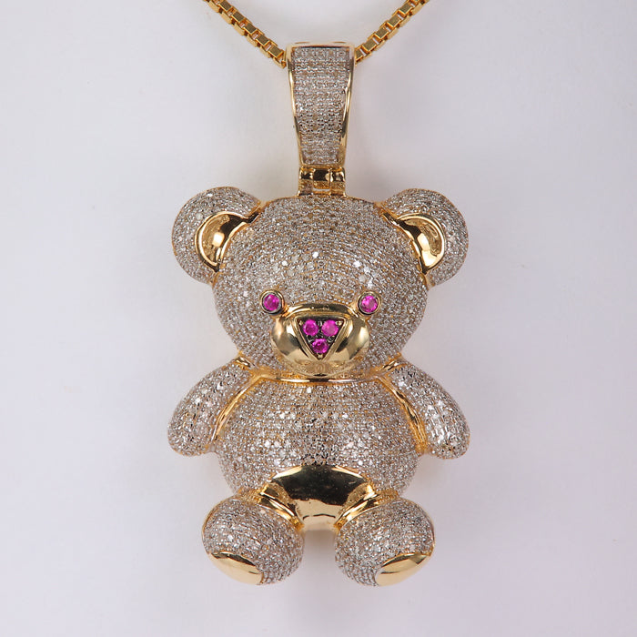 yellow gold diamond and synthetic pink sapphire gemstone bear pendant 