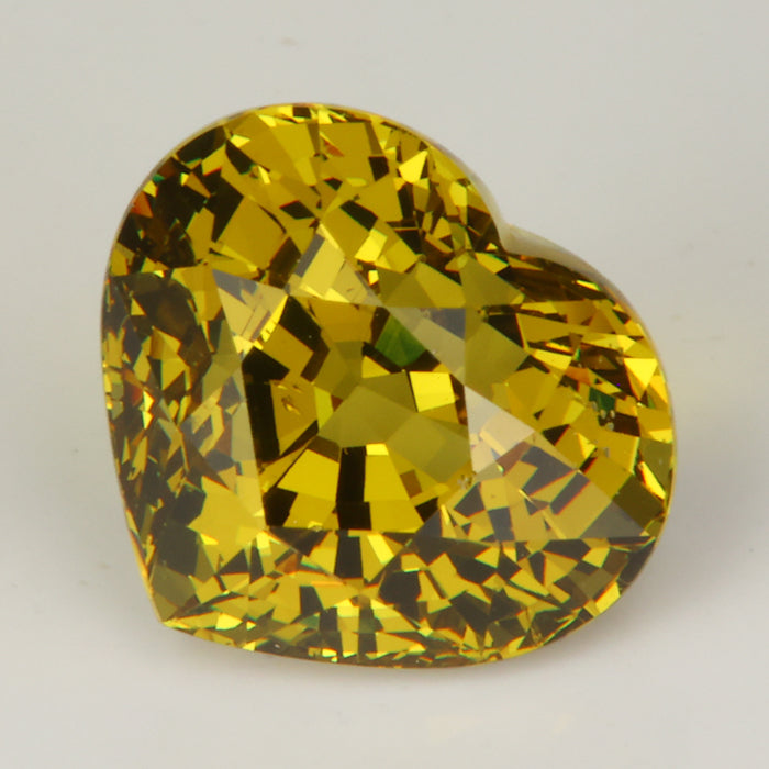 greenish yellow mali garnet heart shape

