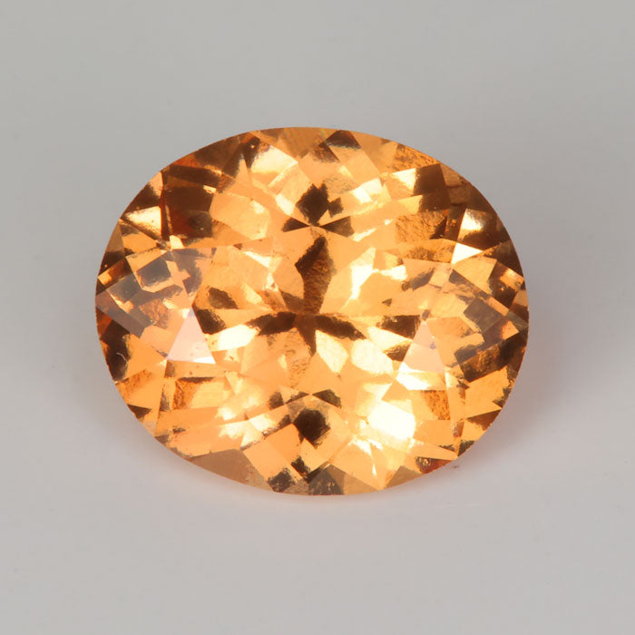 oval peach hessonite garnet