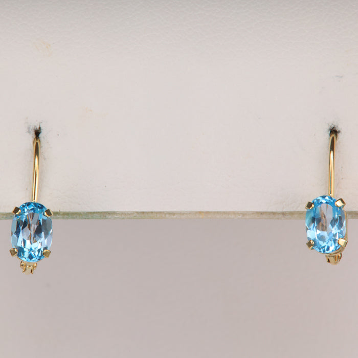 yellow gold hinged back blue topaz gemstone earrings