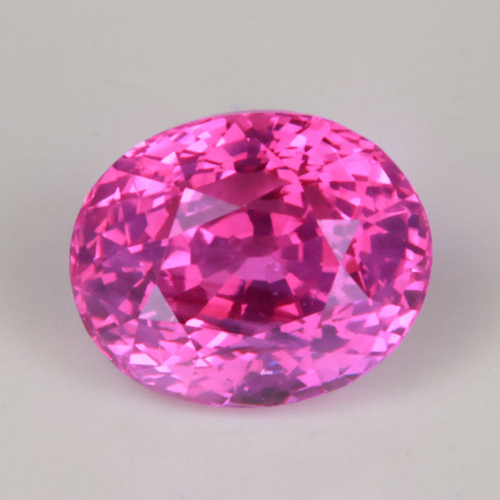 hot pink oval cut sapphire gemstone