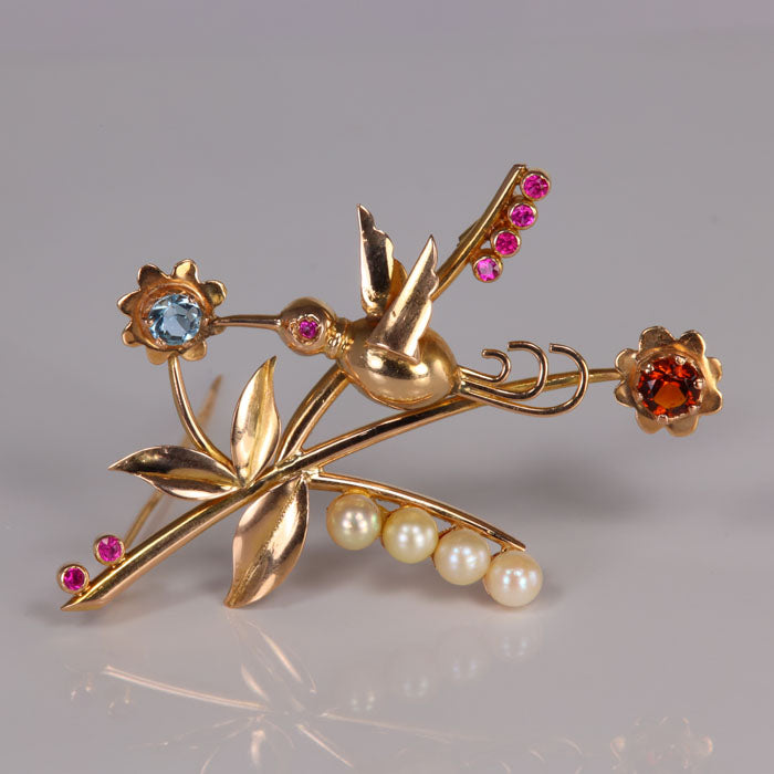 hummingbird pin with ruby aquamarine pearl and garnet