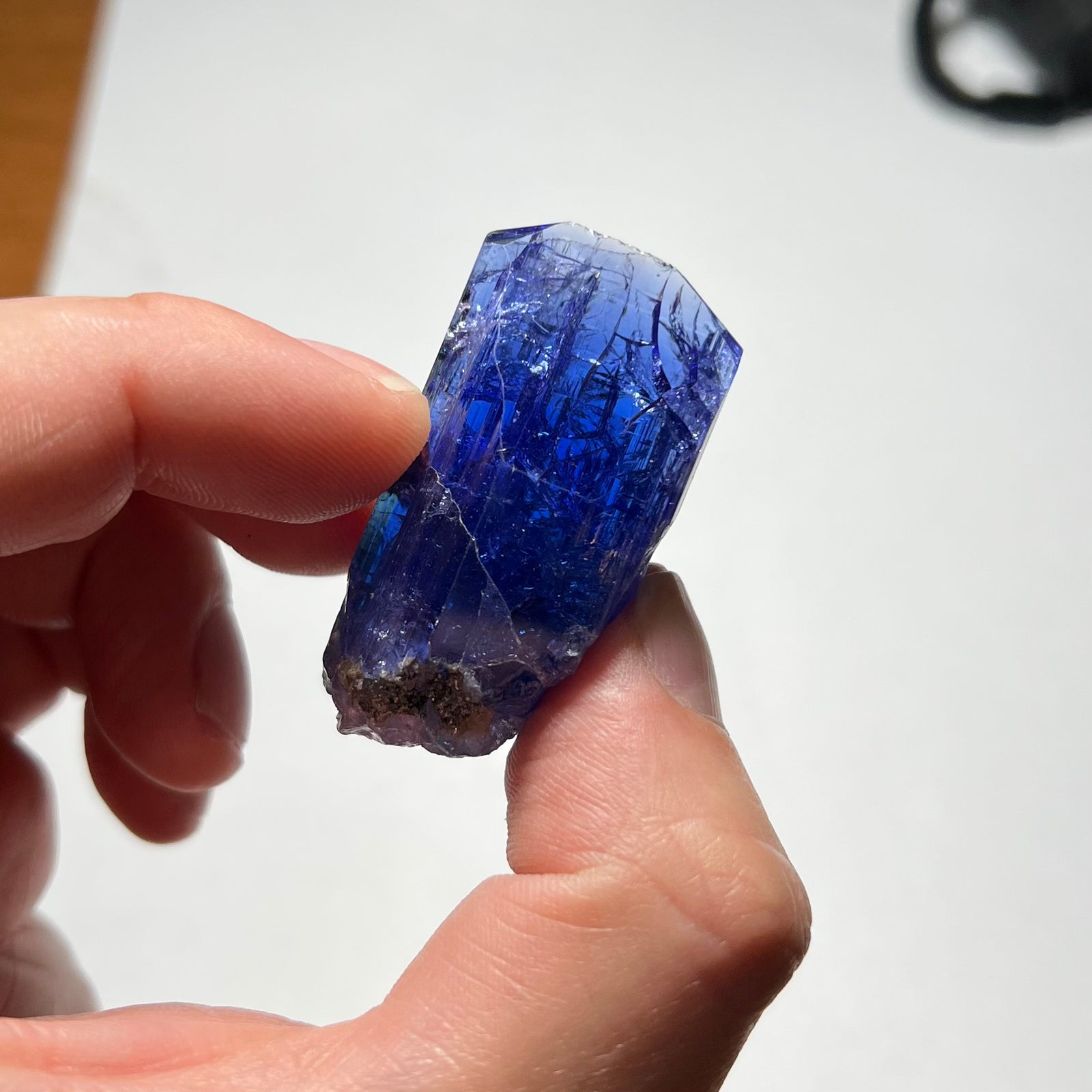 tanzanite crystal in a hand