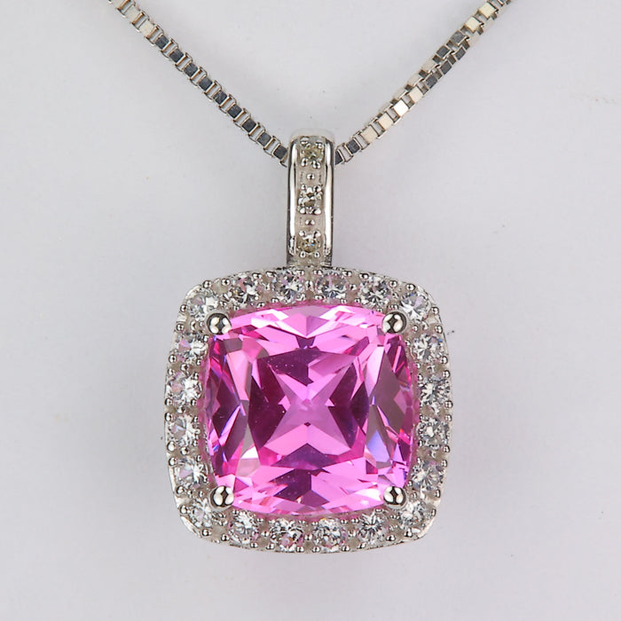 pink and white lab sapphire pendant with diamond accents