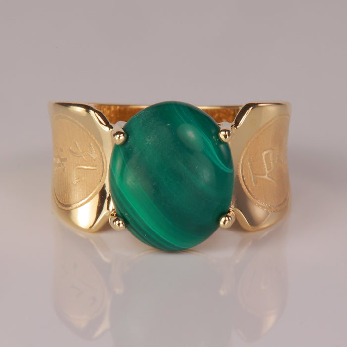 green color malachite ring set in yellow gold 
