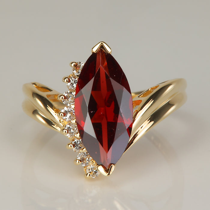 yellow gold marquise brilliant red garnet gemstone ring with diamonds