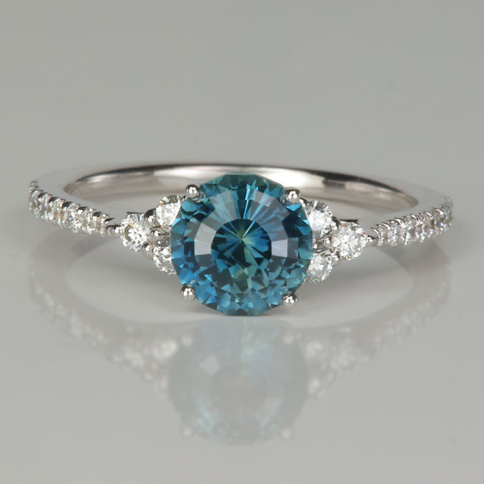 greenish blue step portuguese round cut sapphire from montana in white gold and diamond ring 