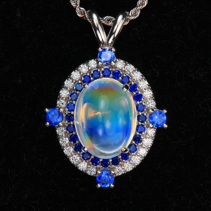oval cut moonstone pendant in white gold with sapphire and diamond