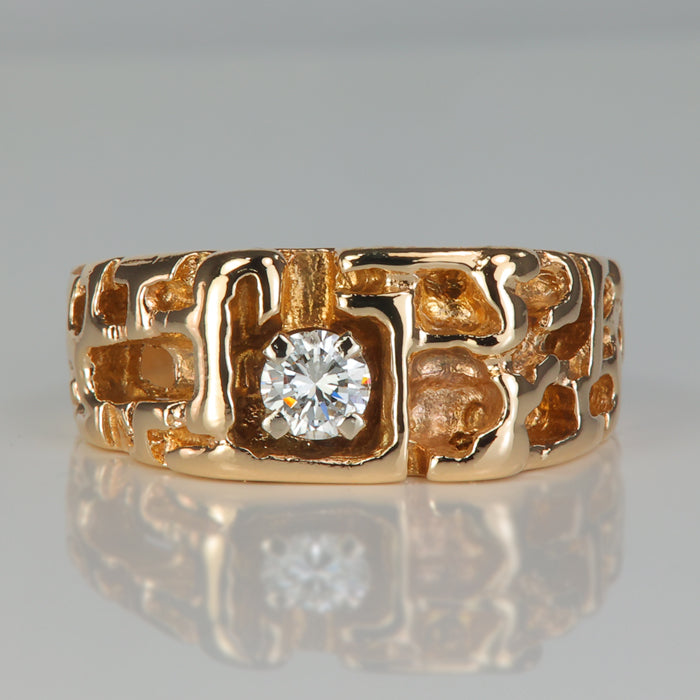 yellow gold carved nugget style ring with diamond