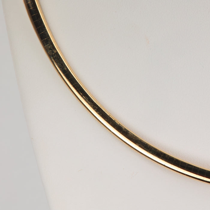 estate omega necklace in yellow gold
