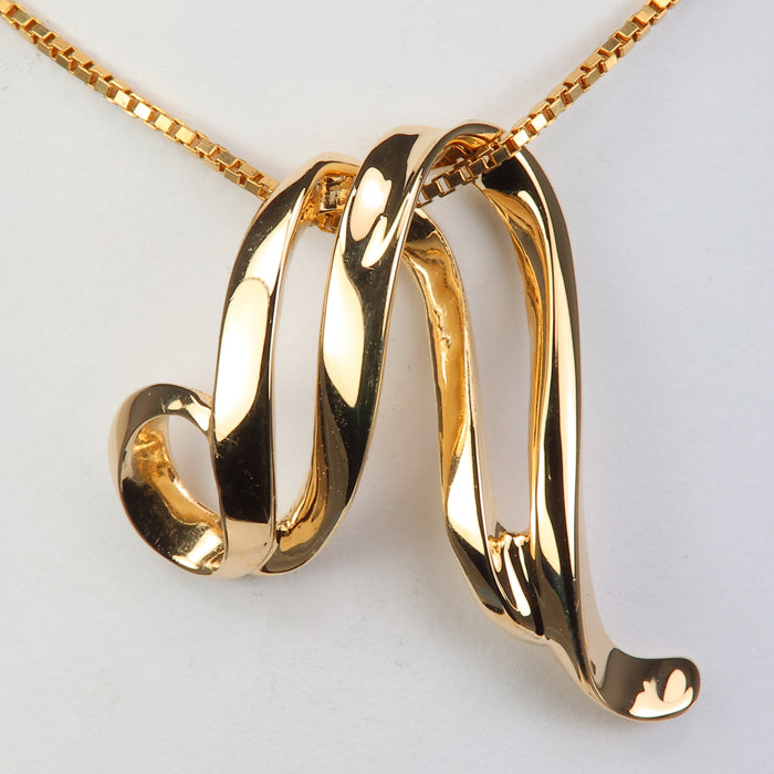 yellow gold omega slide pendant