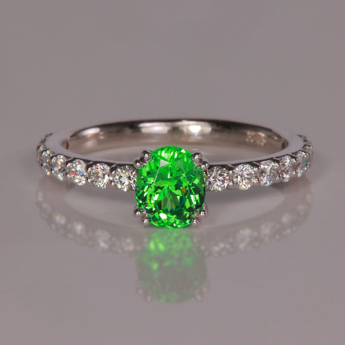 oval cut green tsavorite ring with diamonds in platinum