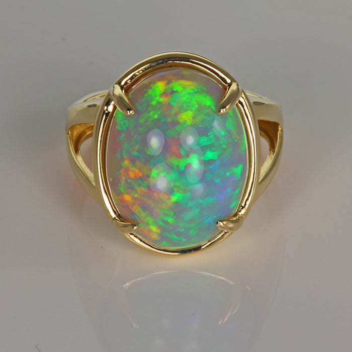 14 Karat Gold Gents Ring with a 14.56 Carat Welo Opal