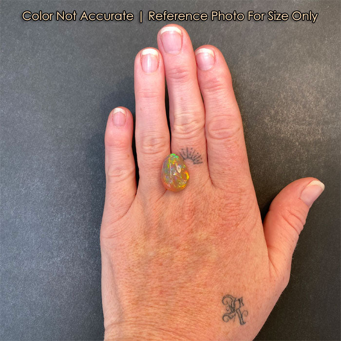 size of opal gemstone on a hand