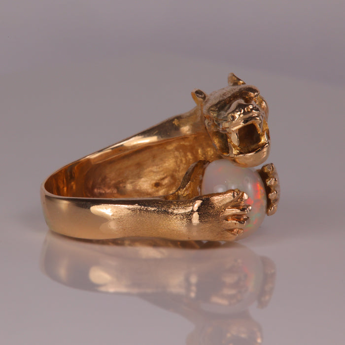 opal gemstone ring with yellow gold panther 