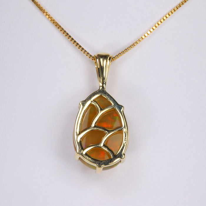 yellow gold and pear opal pendant