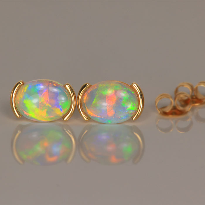 Oval Austrailian Opal Earrings in 14k yellow gold