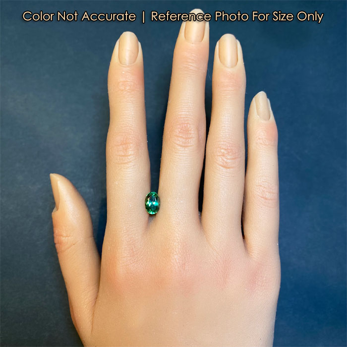 size of oval tsavorite gem on hand