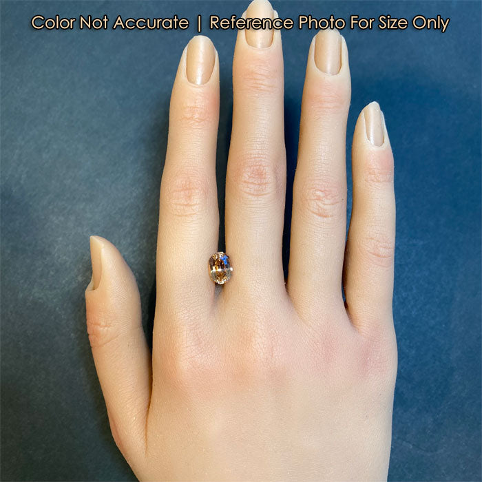 peach stepped oval tourmaline size on hand
