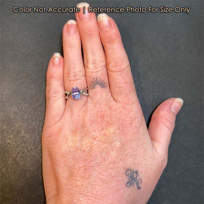 size of oval cut sapphire and diamond ring