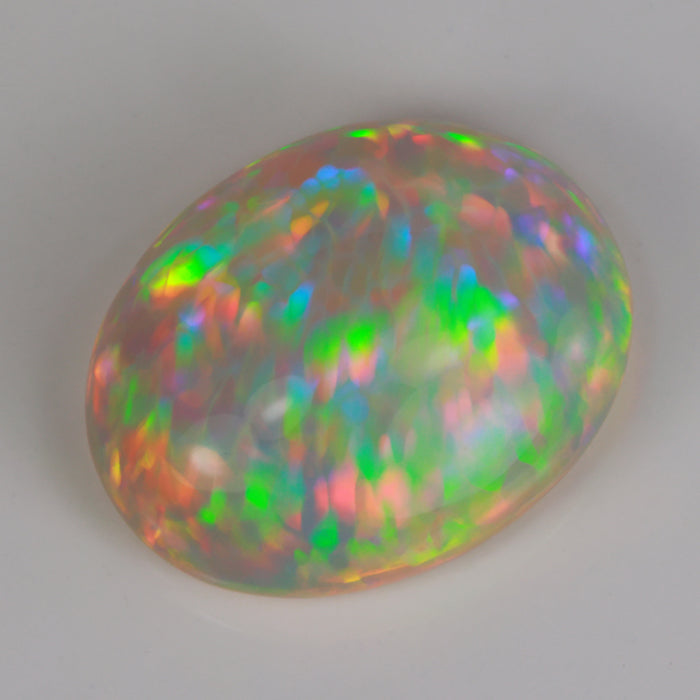 oval cabochon opal gem rainbow colors