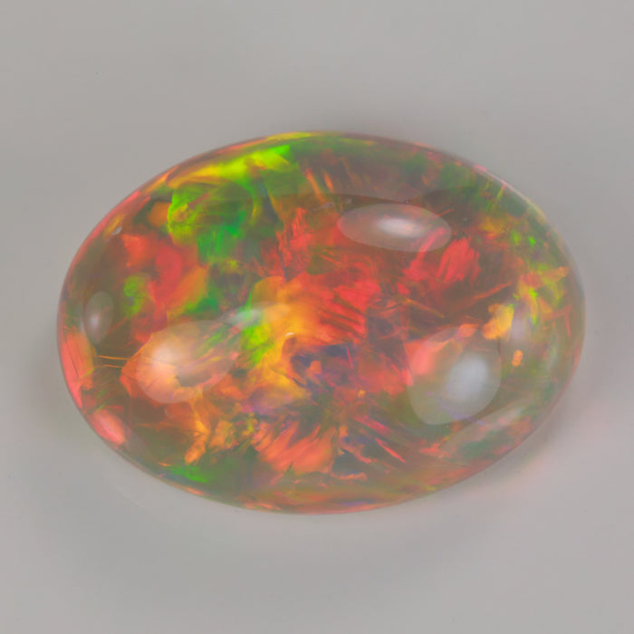 oval cut opal gem semi black color