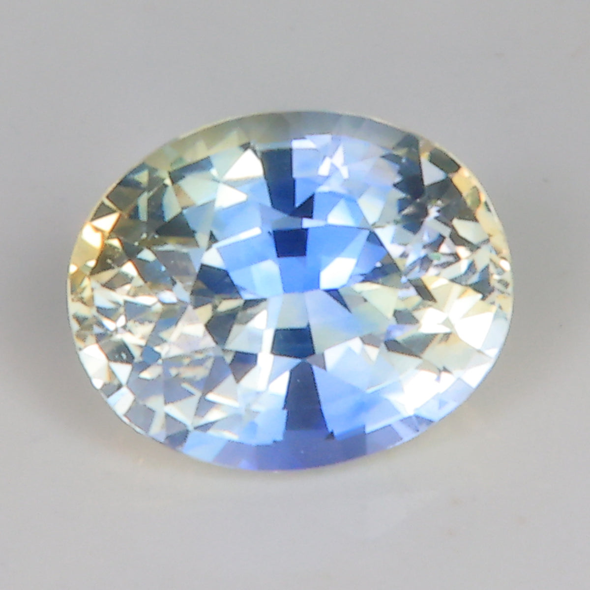oval yellow and blue sapphire gemstone