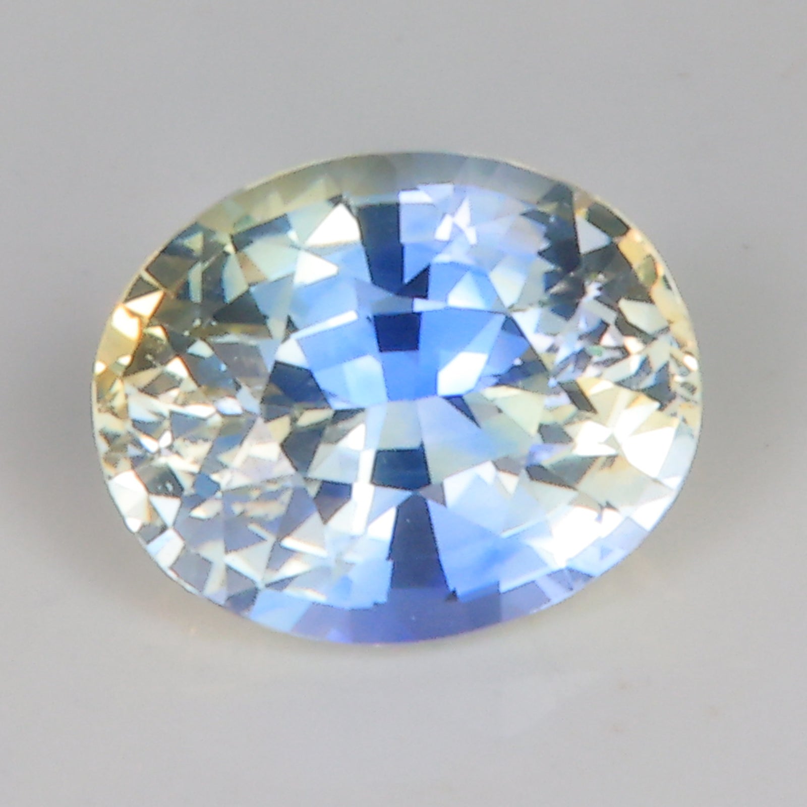 oval yellow and blue sapphire gemstone