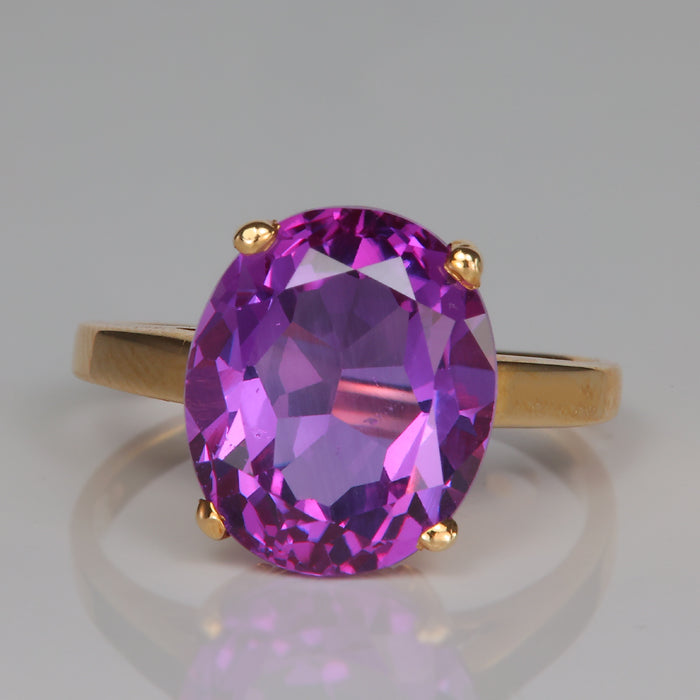 purple color synthetic sapphire ring
