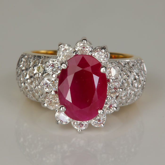 yellow gold oval cut ruby ring with diamonds