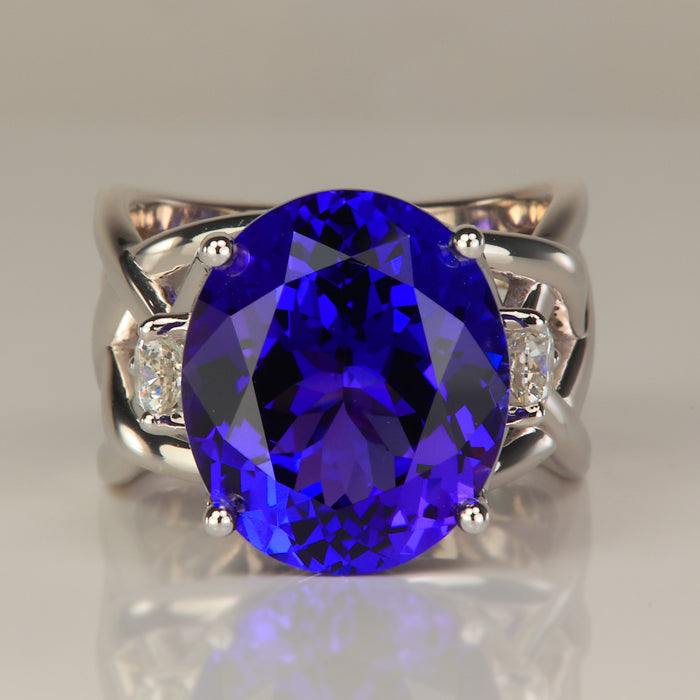 white gold oval cut large tanzanite gemstone ring with two diamond accents