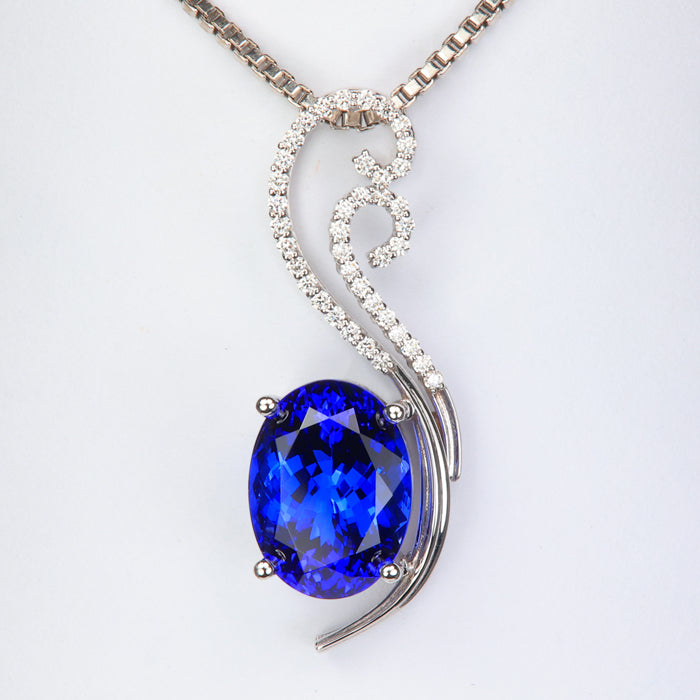 white gold oval tanzanite pendant with diamonds