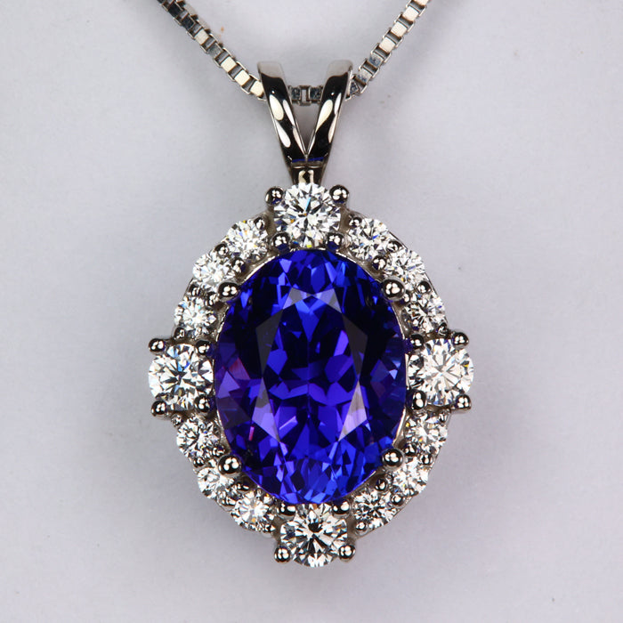 oval cut blue violet tanzanite and diamond pendant