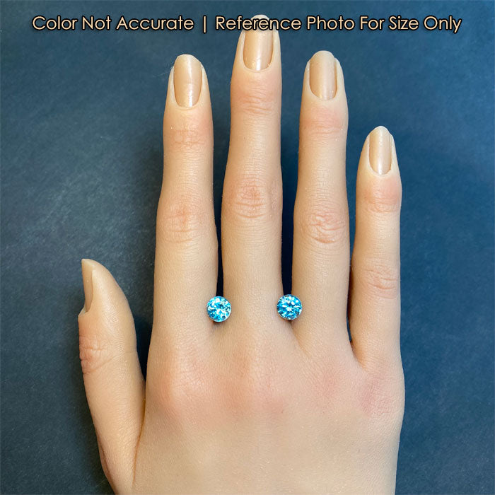 round brilliant green blue zircon pair