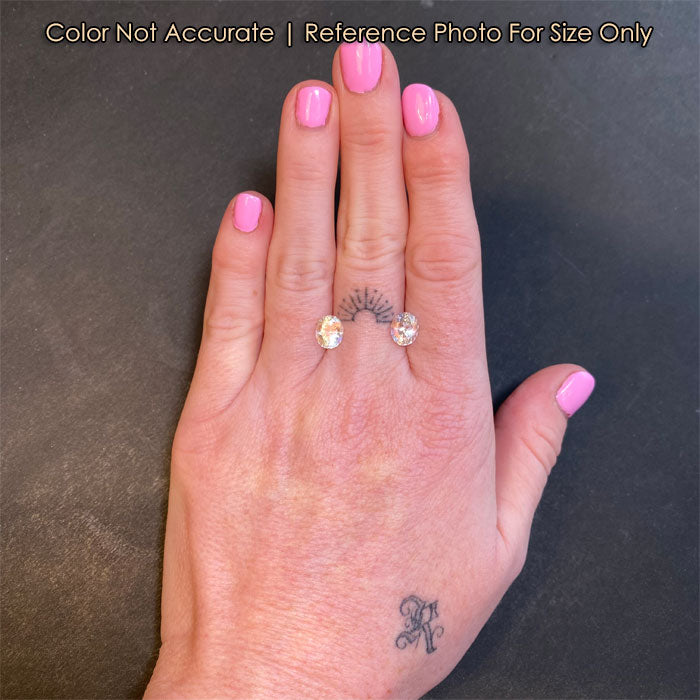 oval cut rainbow moonstones size to a hand