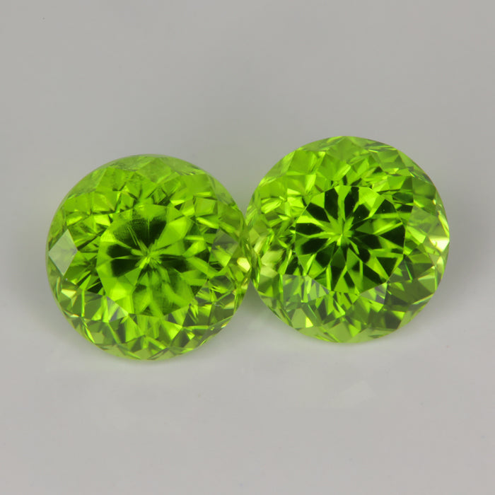 pair of green color round portuguese cut peridot gems