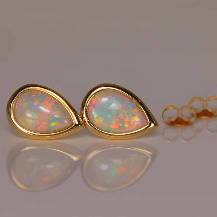 Pear Shape Bezel Australian Opal Earrings in yellow gold
